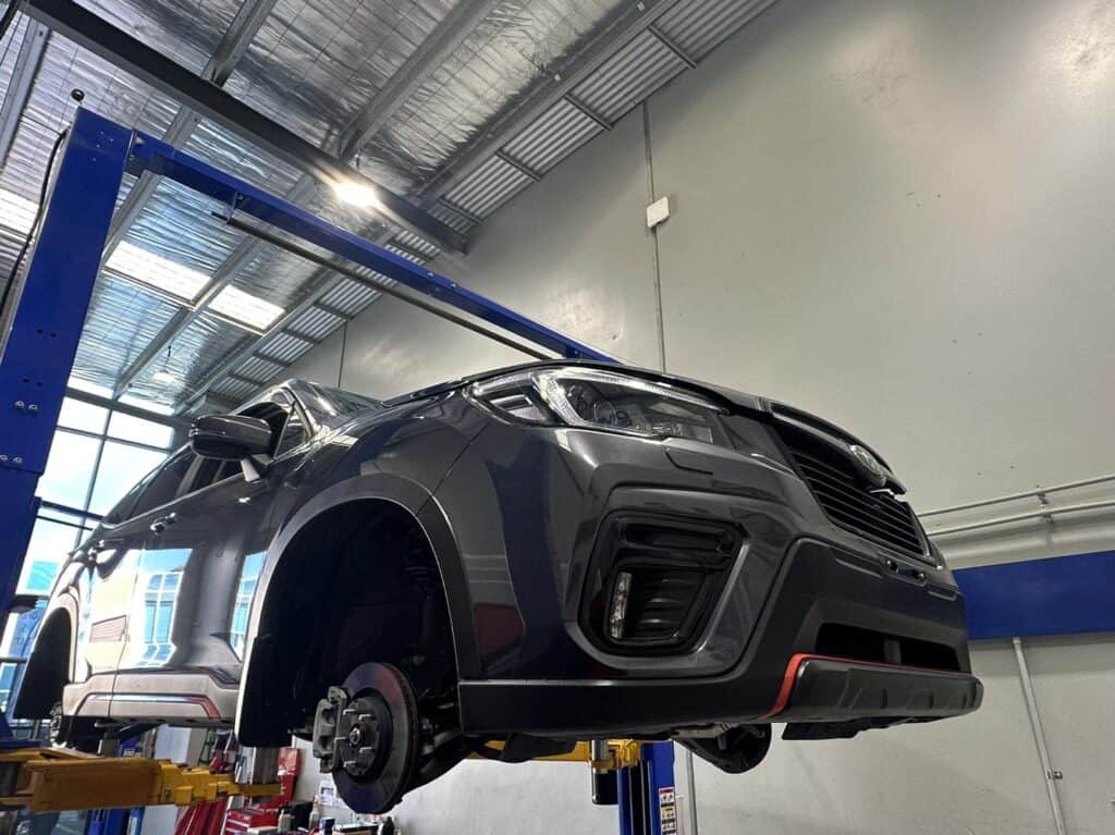 roadworthy certificate ardeer subaru inspected on hoist